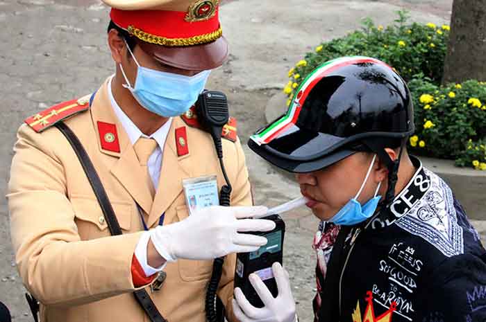 Traffic police uniforms when patrolling and controlling in Vietnam 